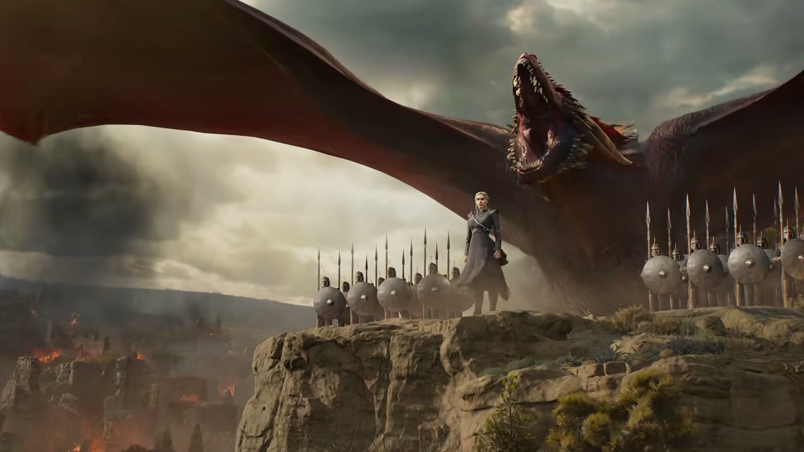 Daenerys before Drogon and a line of Unsullied in Game of Thrones: War for Westeros