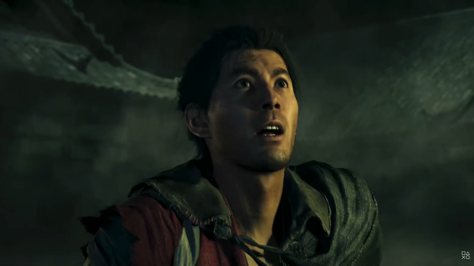 A man in patched clothes under the eaves of a roof in Onimusha: Way of the Sword