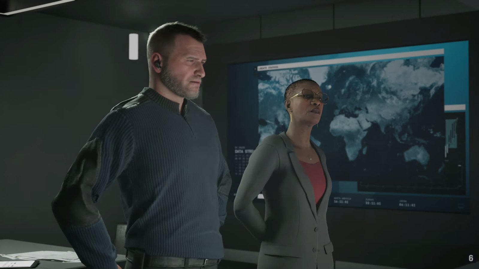 Two characters in a briefing room with a world map in Rainbow Six Tactics