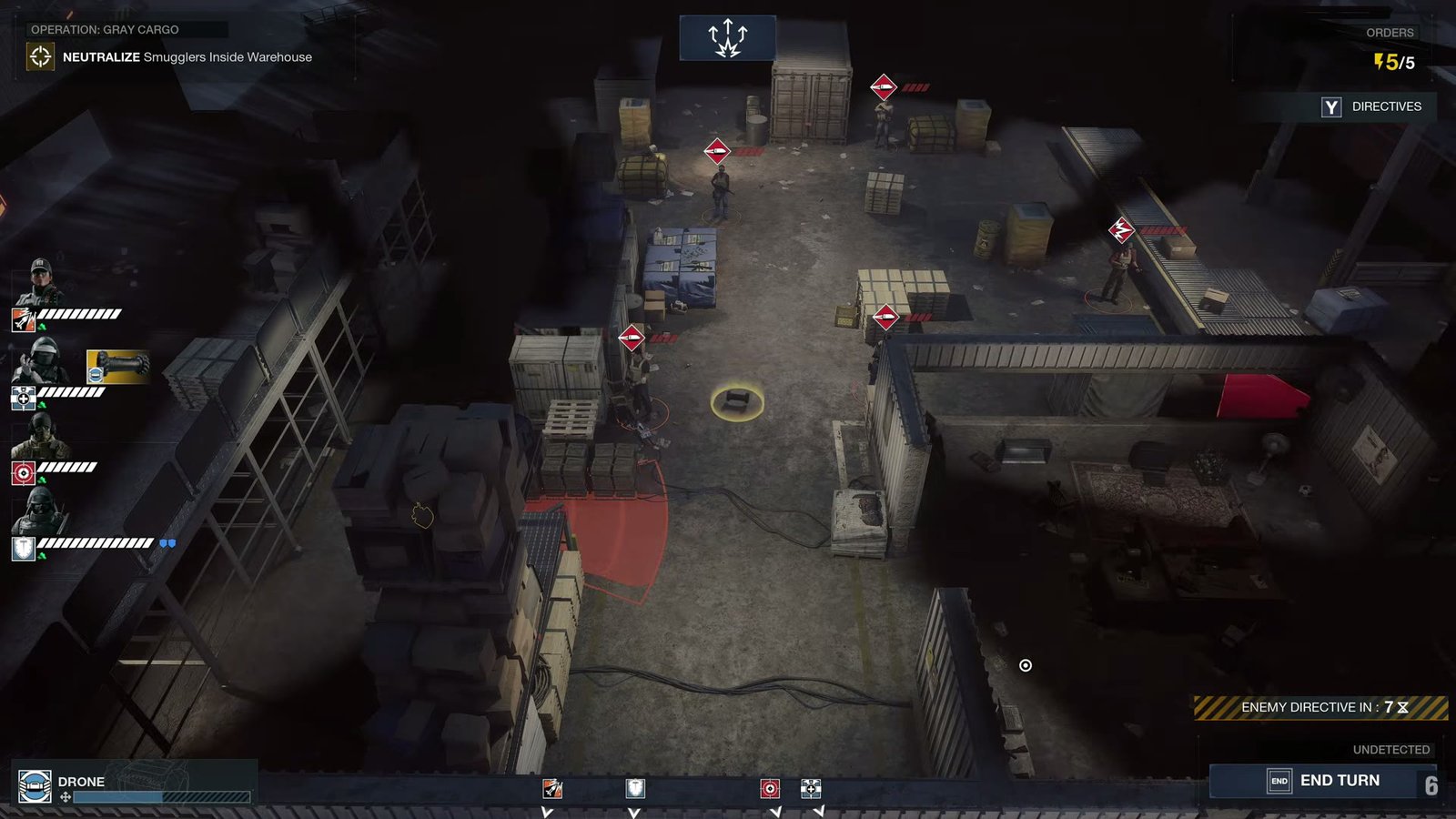 A turn-based warehouse mission with the squad down the side in Rainbow Six Tactics