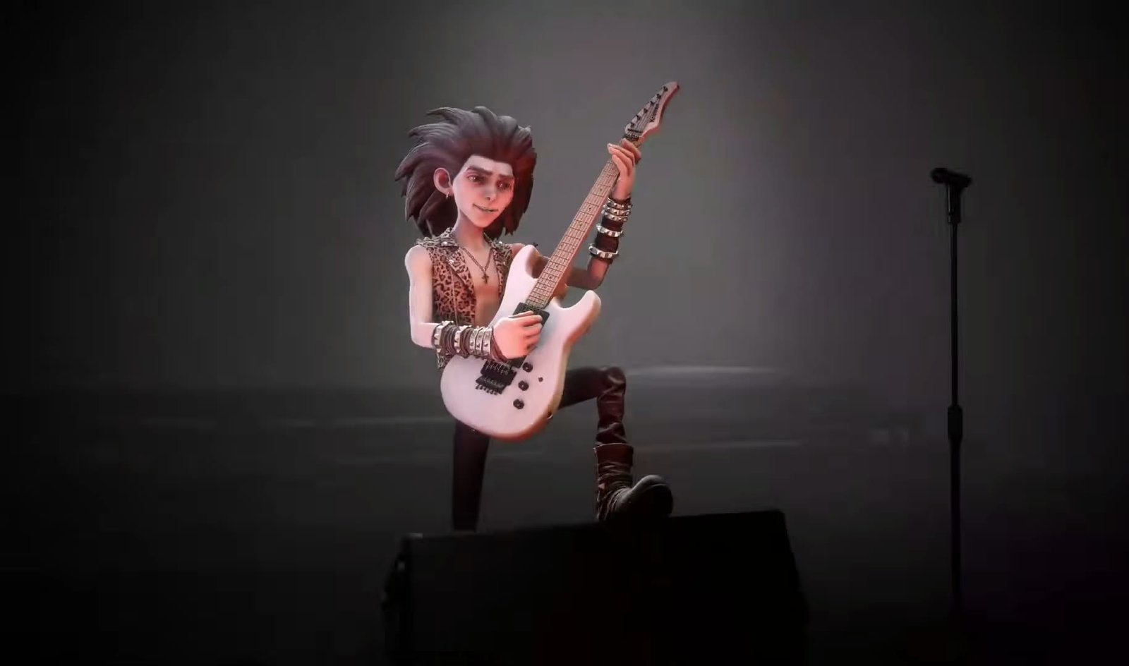 A guitarist playing alone on a dark stage in Stage Tour